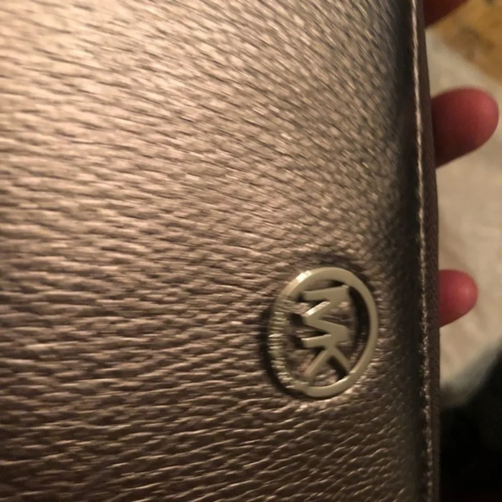 Michael kors silver metallic clutch zipper wall wristlet